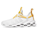 A white athletic sneaker with a breathable knit upper, yellow laces and pull tabs, and a sculpted white sole featuring large cutout sections. The design has a lightweight, modern look with a sock-like collar and supportive side detailing.