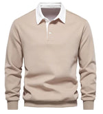 A long-sleeve polo shirt with a white collar and a three-button placket. The fabric appears soft, and the cuffs and hem have a fitted design. The shirt has a classic and stylish look, suitable for both casual and semi-formal wear.