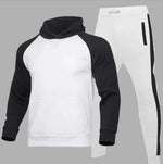 A stylish two-piece men's tracksuit. The set includes a hooded sweatshirt with a kangaroo pocket and long gray sleeves, along with matching jogger pants that have a drawstring waist and gray side panels with zippered pockets. The design offers a sporty yet casual look, ideal for workouts or everyday wear.