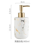 White marble-pattern soap dispenser with a gold pump, labeled with dimensions (8 cm wide, 12.5 cm tall plus 6.5 cm pump height) and text indicating 400 ml capacity.