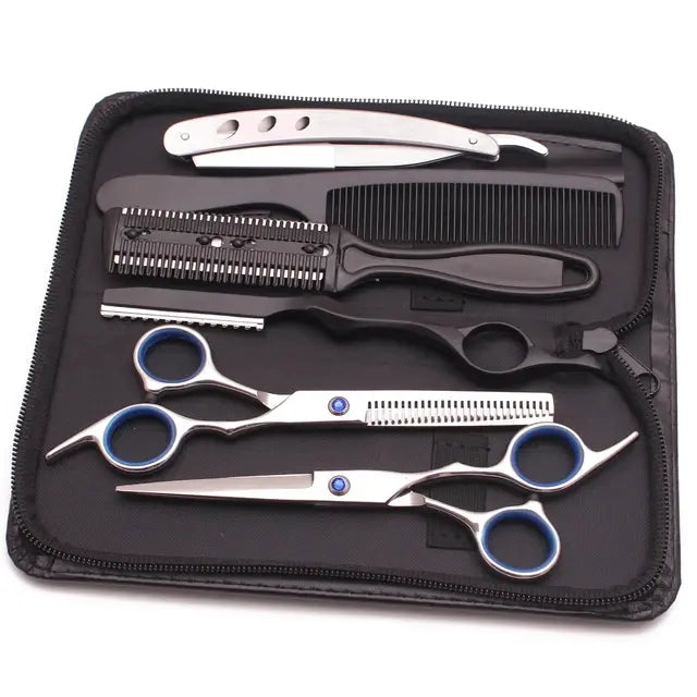 Haircutting tool kit in a zippered case, including two silver hair scissors (one thinning shears), a black comb, and a rainbow-finish straight razor, arranged on a black interior.