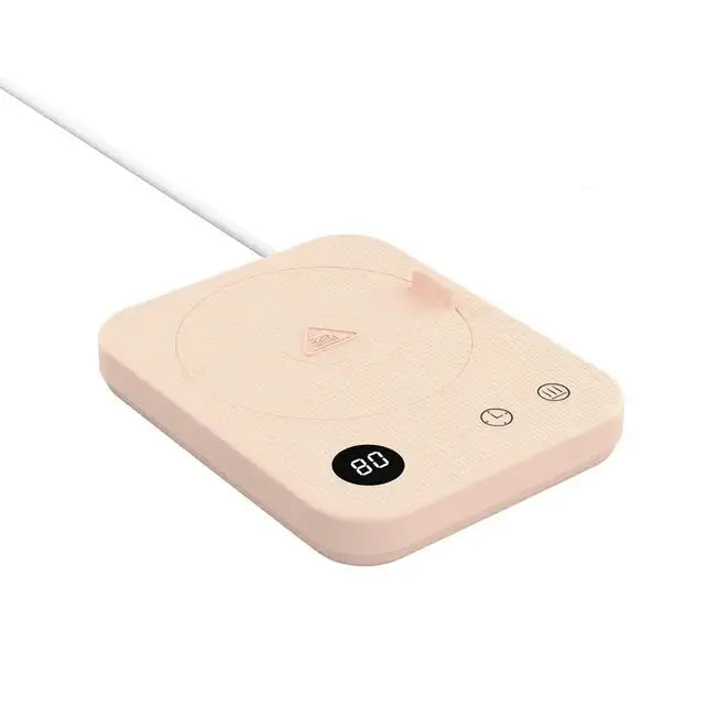 Small beige electric cup warmer/coffee heater with a power cord, round heating plate, and an LED display showing “80,” plus touch buttons on the right, shown on a white background.