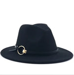 Black wide-brim fedora-style hat with a band featuring a gold ring and small buckle detail, shown on a white background.