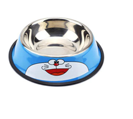 A stainless steel pet bowl with a blue outer rim featuring a red stripe and a white star emblem, resembling a superhero-inspired design. The bowl has a non-slip black rubber base for stability and is designed for feeding pets like dogs or cats.