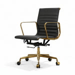 Black office chair with gold accents on a white background