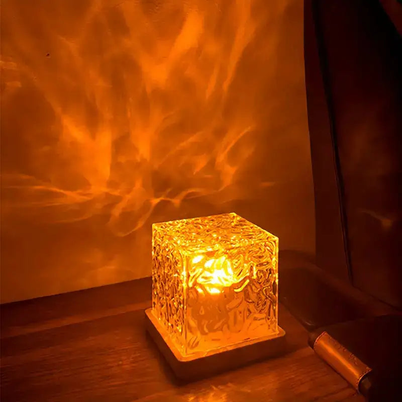 Amber cube night light with textured projection effect.