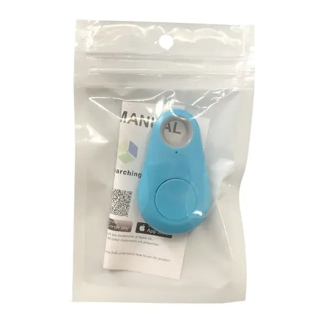 Small blue keychain-style Bluetooth tracker with a round button, sealed in a clear resealable plastic pouch with an instruction card inside.