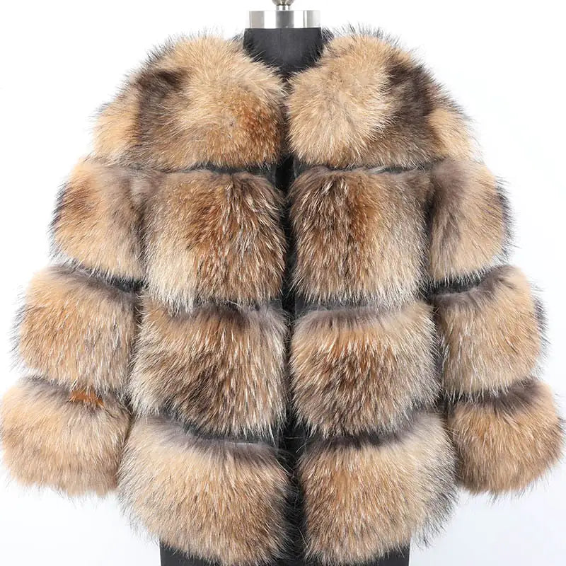 Short fluffy faux fur jacket in natural brown and beige tones with a voluminous collar and horizontal panelled design.