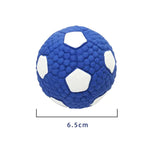 A product image of a small textured mini volleyball on a white background, colored white with yellow and blue curved panels. A measurement line underneath indicates the ball is 6.5 cm wide.