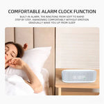 Ad graphic reading “COMFORTABLE ALARM CLOCK FUNCTION,” showing a woman sleeping in bed beside a fabric-covered digital alarm clock on a bedside table displaying 06:00.
