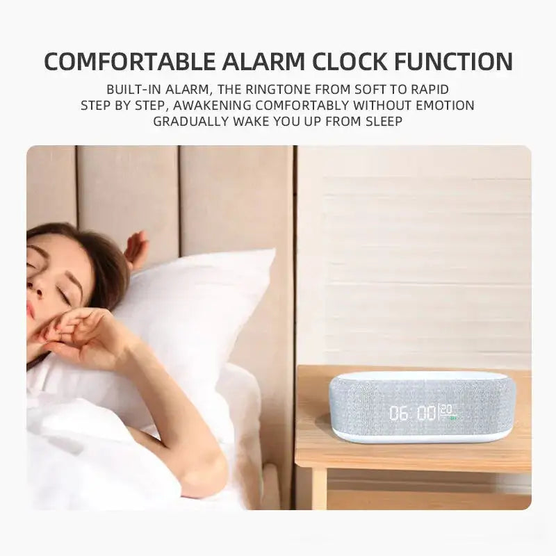 Ad graphic reading “COMFORTABLE ALARM CLOCK FUNCTION,” showing a woman sleeping in bed beside a fabric-covered digital alarm clock on a bedside table displaying 06:00.