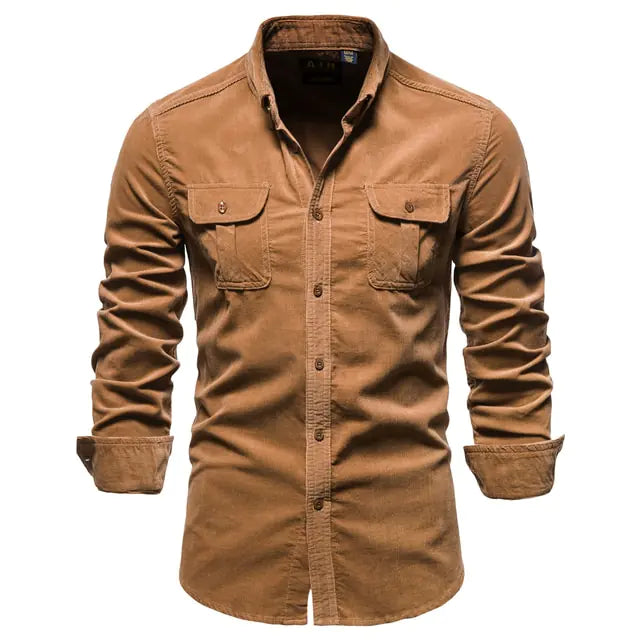 A stylish long-sleeved button-up shirt with a classic collar. The shirt features two symmetrical chest pockets with buttoned flaps, giving it a rugged yet sophisticated look. The sleeves are slightly rolled up, adding a casual touch to the overall design.