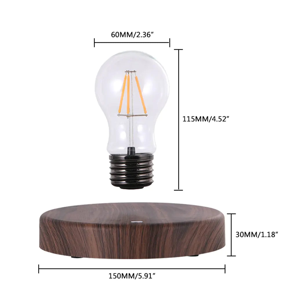 Floating magnetic LED bulb lamp showing a clear filament bulb above a round wood-grain base, with size labels: bulb 60 mm wide and 115 mm tall; base 150 mm wide and 30 mm tall.