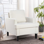 White armchair in a modern living room setting with a small table and plant.