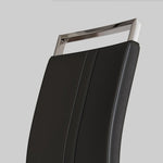Black leather chair with a silver metal frame on a light gray background