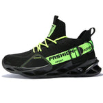 Black knit sneaker with neon green laces and strap accents labeled “FASHION SPORT,” featuring a pull tab and a chunky cutout-style sole.