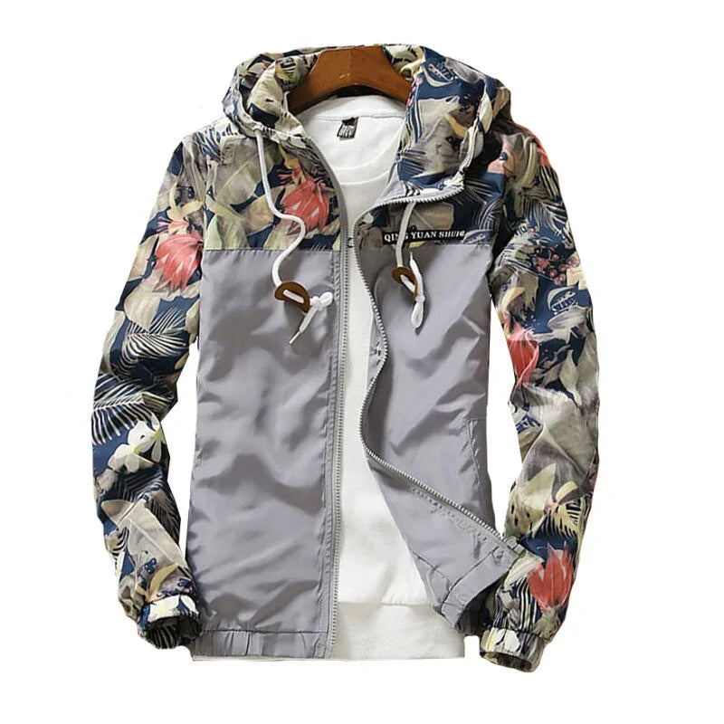 Light grey zip-up hooded jacket with floral print sleeves, drawstring hood and elastic cuffs.
