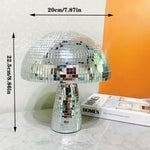 Silver mosaic-tile table lamp shaped like a mushroom on a tabletop, with measurement arrows showing 20 cm (7.87 in) wide and 22.5 cm (8.86 in) tall, next to a book.