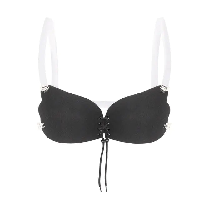 A black strapless adhesive bra with a front lace-up closure and transparent shoulder straps, shown against a plain light background.