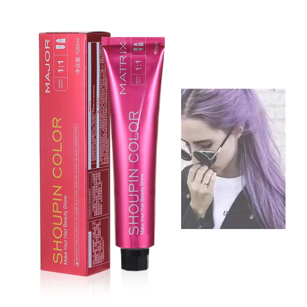 A tube of ShouPin hair dye color cream next to a woman with lavender-colored hair.