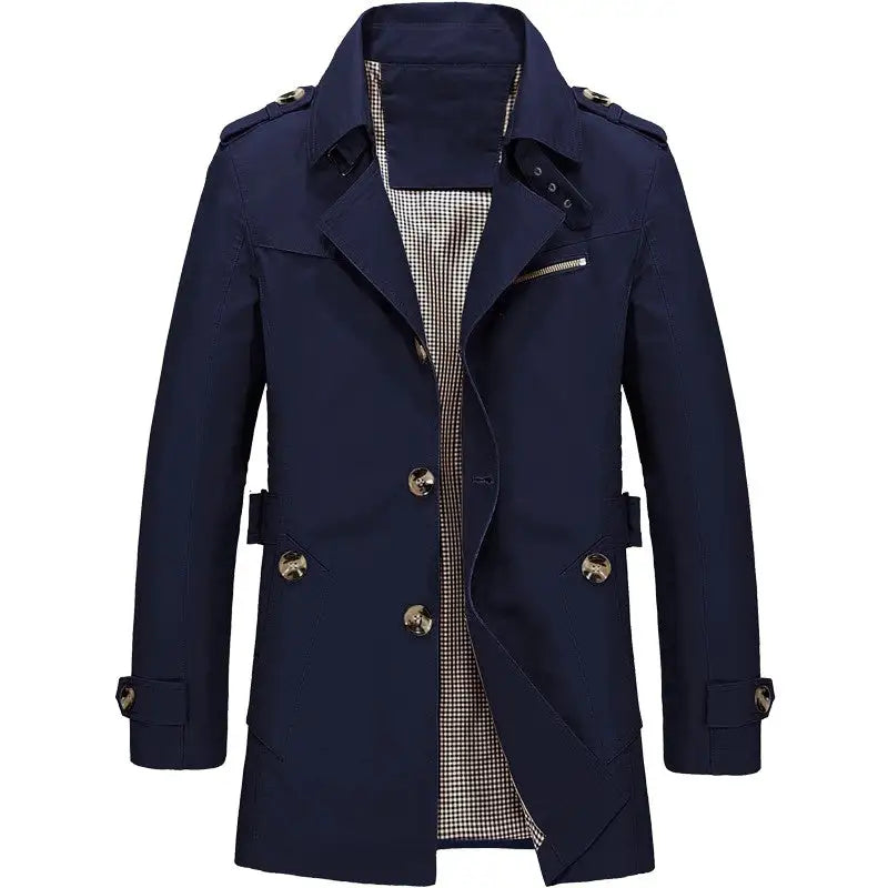 Navy blue men’s trench-style coat with a wide lapel collar, double-breasted buttons, shoulder epaulets, and a visible checkered lining, shown on a white background.