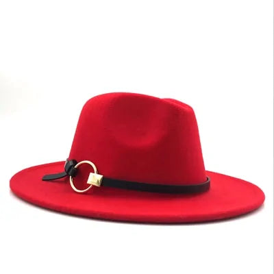 Red wide-brim felt hat with a black band and gold ring detail, photographed on a white background.