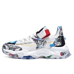 All-white athletic sneaker with laces, a knit upper, side straps printed “FASHION” and “SPORT,” and a chunky hollow-cutout sole, shown in side view on a white background.