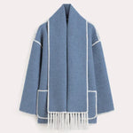 Dark wool coat with white blanket stitch trim, featuring front buttons, large patch pockets, and an attached matching scarf with fringe detailing draped over the shoulder. The coat is displayed against a plain white background.