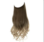 Long wavy halo hair extension with dark brown roots fading to light blonde ends, on a white background.