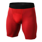 Red compression shorts with a black waistband, shown front view on a white background.