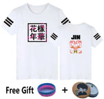White graphic T-shirt with black sleeve stripes, floral text print on the front and “JIN 92” print on the back, shown with free gift accessories.