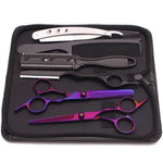 Haircutting tool kit in a zippered case, including two silver hair scissors (one thinning shears), a black comb, and a rainbow-finish straight razor, arranged on a black interior.