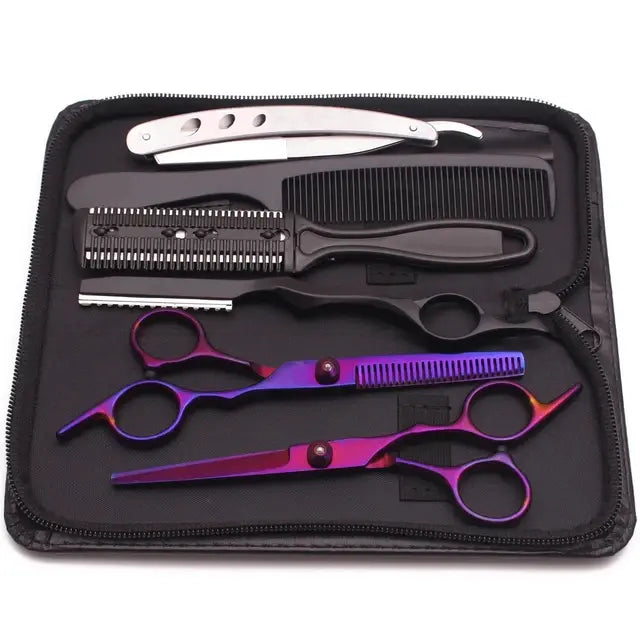 Haircutting tool kit in a zippered case, including two silver hair scissors (one thinning shears), a black comb, and a rainbow-finish straight razor, arranged on a black interior.