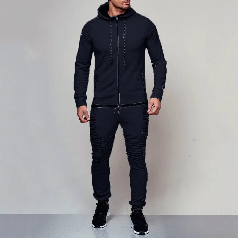 Black men’s hooded tracksuit with zip-up jacket and ribbed jogger details.

