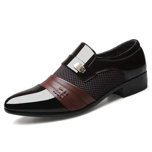 A black formal dress shoe with a glossy toe, brown strap detail, mesh side panels, and a low heel.