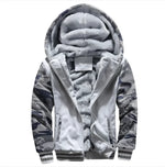 A stylish two-tone hoodie with a navy blue body and red sleeves, featuring a thick, plush gray fleece lining for warmth. The hood is large and lined with the same soft material, and the jacket includes a full-length zipper and two front pockets with red accents. Designed for cold weather comfort.