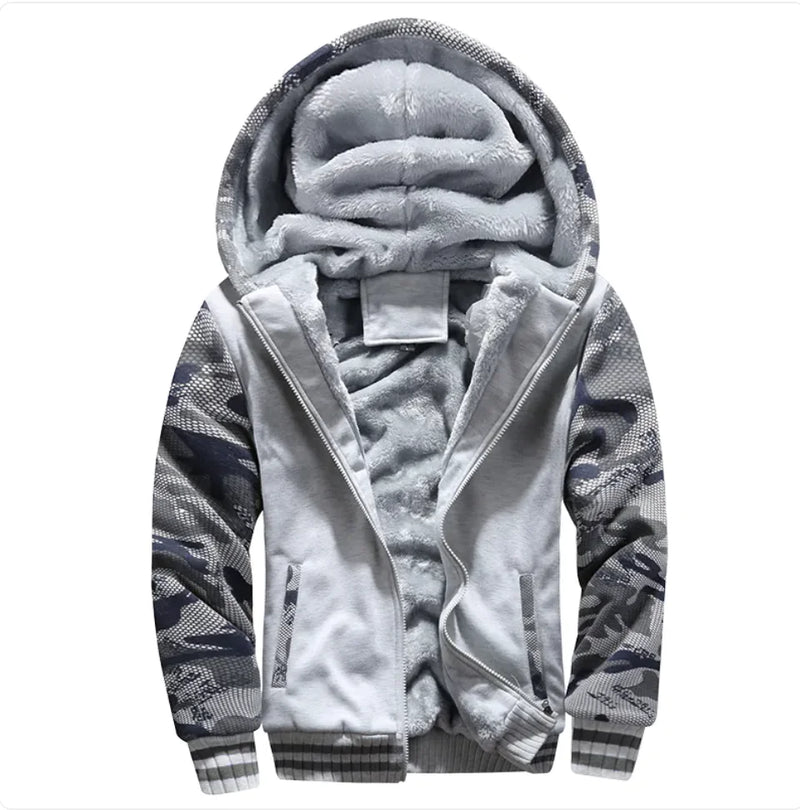 A stylish two-tone hoodie with a navy blue body and red sleeves, featuring a thick, plush gray fleece lining for warmth. The hood is large and lined with the same soft material, and the jacket includes a full-length zipper and two front pockets with red accents. Designed for cold weather comfort.