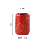 Red glossy bathroom tumbler/toothbrush holder with gold marble-like veining, shown with dimensions labeled 11 cm tall and 7.5 cm wide, plus Chinese text beneath.
