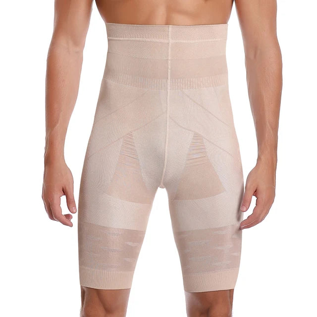 A male model wearing high-waisted beige compression shorts designed for body shaping and support. The seamless fabric features different textured zones, likely for targeted compression around the abdomen, thighs, and lower back. The material appears stretchy and form-fitting, aiming to provide a slimming effect, posture support, and muscle stabilization.