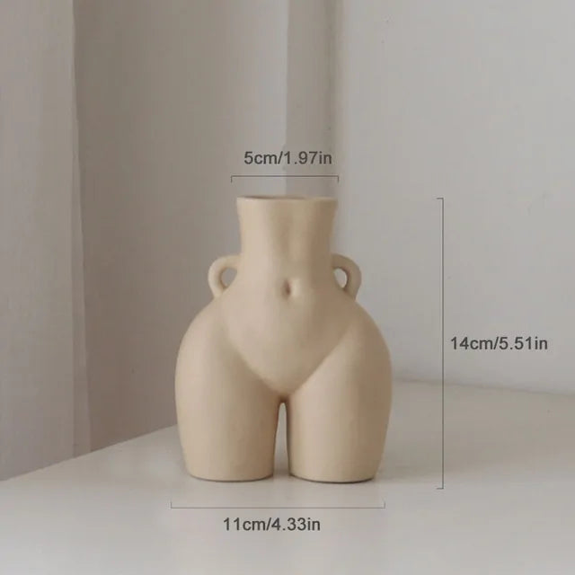 Beige torso-shaped decorative vase with small side handles and size measurements shown.