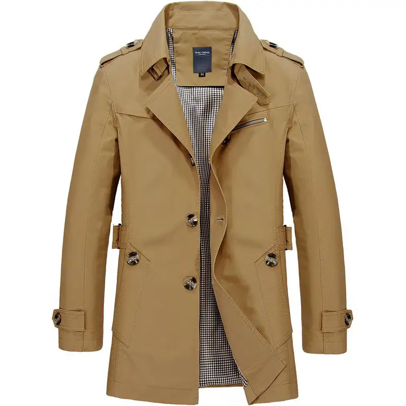 Tan trench coat with wide lapels, shoulder epaulets, button front, zip chest pocket, and adjustable cuff straps, shown on a white background with a checkered lining visible inside.