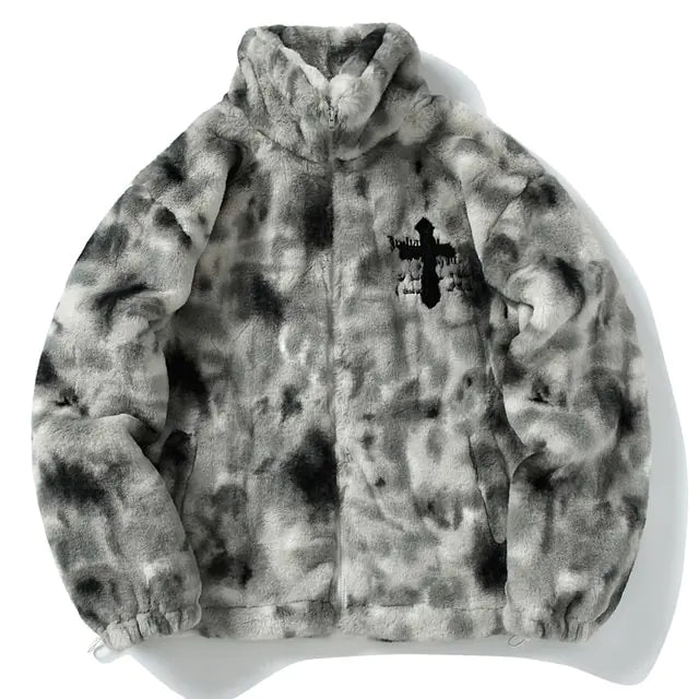 A plush zip-up fleece jacket in a gray and black mottled pattern, featuring a high stand collar, long sleeves, and side pockets. It has a soft fuzzy texture and a small dark graphic detail on the chest, giving it a cozy streetwear look.