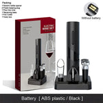 Electric wine opener gift set in black, showing the retail box and the opener on a charging base with accessories (foil cutter, wine pourer, and stopper); text notes “Without battery” and “Battery [ABS plastic / Black].