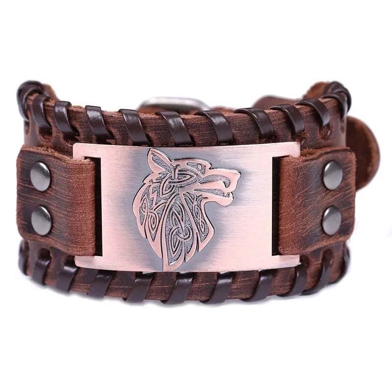 Leather bracelet with a metal wolf head clasp and braided design, featuring black studs.