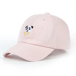 Light pink baseball cap with an embroidered panda face and a yellow banana, shown on a white background.