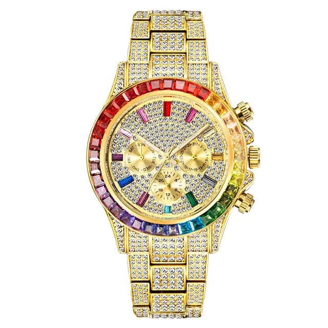 Gold-tone rhinestone-covered wristwatch with a multicolor gem bezel and matching jeweled bracelet band, featuring three subdials on the face.