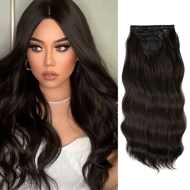On the left side of the image, a woman is shown wearing long, dark, wavy hair with a natural-looking shine. Her hair has a slight wave and is parted in the middle. On the right side of the image, a matching clip-in hair extension is shown, with dark hair flowing in loose waves, featuring clips for attachment. The hair extension's texture and color match the woman's natural hair, providing a seamless look.