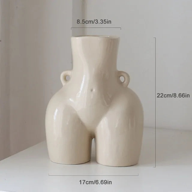 Cream abstract body-shaped vase with size measurements shown.