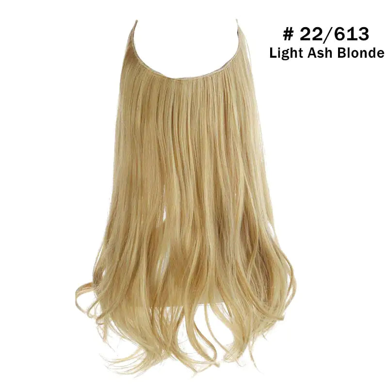 Long wavy blonde hair extension piece with loose curls at the ends, shown on a white background.