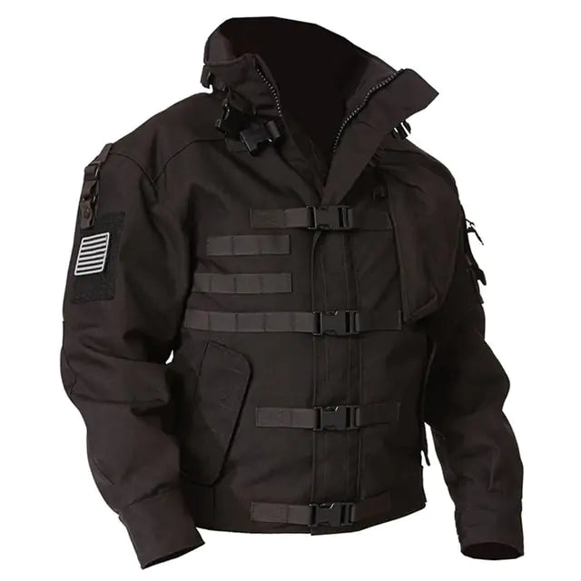 Black tactical-style jacket with a high collar, front zipper, multiple buckle straps across the chest, and sleeve patches, shown on a white background.